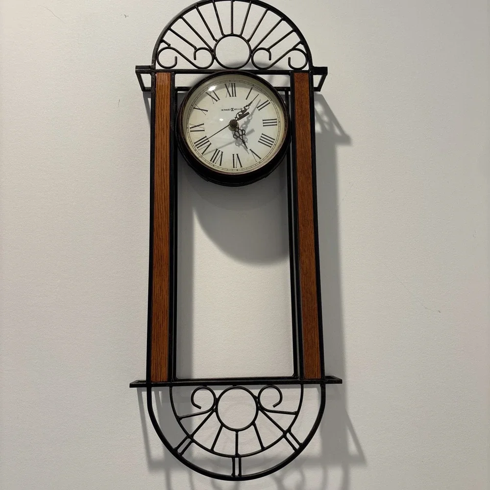 Howard Miller Devahn Wall Clock Antique Bronze Wrought Iron Roman Numeral 625241